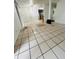 Spacious living space showcasing tile flooring and a versatile layout at 2829 Sanford Ave, Sanford, FL 32773