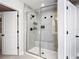 Bright bathroom boasts a glass enclosed shower with a built in bench at 2943 Slough Creek Dr, Kissimmee, FL 34744