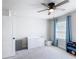 Bright, airy bedroom with natural light, ceiling fan, and classic white furnishings at 2943 Slough Creek Dr, Kissimmee, FL 34744