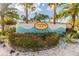 Margaritaville Resort Orlando entrance sign surrounded by lush landscaping and flowers at 3036 Parrot Head Pl, Kissimmee, FL 34747