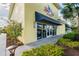 Facade of the 'Fins Up! Fitness' center with glass doors, showing a well-maintained exterior and inviting entrance at 3036 Parrot Head Pl, Kissimmee, FL 34747