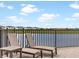 Relax in one of the lounge chairs with a small table on this beautiful brick patio at 3036 Parrot Head Pl, Kissimmee, FL 34747