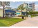Exterior view of 'St. Somewhere Spa' with outdoor seating, offering a serene and relaxing environment at 3036 Parrot Head Pl, Kissimmee, FL 34747