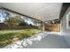 Expansive backyard with covered patio, ideal for outdoor entertaining and relaxation at 3403 Canute Pl, Orlando, FL 32818