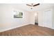 Bright bedroom with closet and view to the en-suite bathroom at 3403 Canute Pl, Orlando, FL 32818