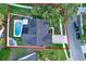 A full property outline of the yard with patio, pool and landscaping of this residential home at 3499 Woodley Park Pl, Oviedo, FL 32765