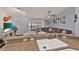Open kitchen with granite countertops, stainless steel sink, and view to the living room at 3499 Woodley Park Pl, Oviedo, FL 32765