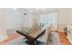 Bright dining area with a spacious table, bench seating, and view to the kitchen at 356 Remington Dr, Oviedo, FL 32765