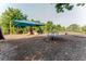 Neighborhood playground with swings, slides, and a merry-go-round, perfect for Gathering fun and community gatherings at 356 Remington Dr, Oviedo, FL 32765
