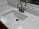 Close up of a modern bathroom vanity with a white countertop and a sleek faucet at 3707 Andover Cay Blvd, Orlando, FL 32825