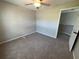 Neutral bedroom with carpeted floor and a ceiling fan at 3707 Andover Cay Blvd, Orlando, FL 32825
