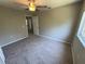 Bedroom featuring a ceiling fan and neutral carpet at 3707 Andover Cay Blvd, Orlando, FL 32825