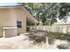 Backyard with a covered patio and privacy fence at 4035 Palo Alto Ct, Orlando, FL 32817