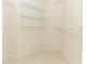 Walk in closet with tile floors and wire shelves at 4035 Palo Alto Ct, Orlando, FL 32817