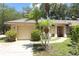 Charming single-story home with a well-maintained lawn and inviting curb appeal, offering a welcoming atmosphere at 4035 Palo Alto Ct, Orlando, FL 32817