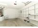 Spacious garage with ample shelving and storage at 4035 Palo Alto Ct, Orlando, FL 32817