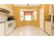 Bright kitchen with window views, offering ample counter space and well-lit area for cooking and dining at 4035 Palo Alto Ct, Orlando, FL 32817