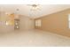 Bright living room featuring tile floors, fan, and neutral walls at 4035 Palo Alto Ct, Orlando, FL 32817