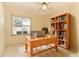 Office featuring tile floors, a bookshelf, and a desk with chair at 4035 Palo Alto Ct, Orlando, FL 32817
