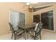 Covered outdoor patio with furniture and a ceiling fan at 4035 Palo Alto Ct, Orlando, FL 32817