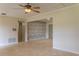 Expansive living room with tile flooring and bright neutral walls at 409 E Gulley Ave, Oakland, FL 34760