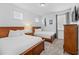 Bedroom with two beds, dressers, and Captain America themed art at 441 Novi Path, Kissimmee, FL 34747