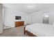Spacious bedroom with carpet, TV, and a king bed at 441 Novi Path, Kissimmee, FL 34747