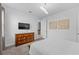 Cozy bedroom with carpet, TV, and modern decor at 441 Novi Path, Kissimmee, FL 34747