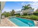 Private pool and spa, surrounded by a well-manicured yard and mature landscaping for privacy at 441 Novi Path, Kissimmee, FL 34747