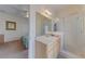 Clean bathroom featuring a glass-enclosed shower and good lighting, ideal for daily routines at 446 Summer Place Loop, Clermont, FL 34714