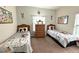 Adorable bedroom featuring twin beds adorned with fun Mickey Mouse decor at 446 Summer Place Loop, Clermont, FL 34714