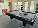 Game room with pool table, connect four game, tables, and chairs at 446 Summer Place Loop, Clermont, FL 34714