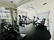Fitness center equipped with treadmills, stationary bikes, and weight machines at 446 Summer Place Loop, Clermont, FL 34714