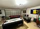 Finished garage offering multiple game options, including pool, air hockey and foosball at 446 Summer Place Loop, Clermont, FL 34714