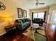 Cozy living room with modern decor and a bright, airy atmosphere at 446 Summer Place Loop, Clermont, FL 34714