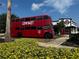 Unique, English-themed restaurant featuring a double-decker bus and British decor at 446 Summer Place Loop, Clermont, FL 34714