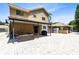 Spacious paved backyard with patio furniture, perfect for outdoor entertaining at 4674 Hall Rd, Orlando, FL 32817