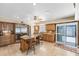 A kitchen with an island, stainless steel appliances, and a large refrigerator at 4674 Hall Rd, Orlando, FL 32817
