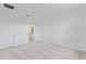 Spacious bedroom with plush carpeting and ensuite bathroom entrance at 499 Silver Palm Dr, Haines City, FL 33844