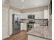 Spacious kitchen equipped with stainless steel appliances, sleek cabinets, and plenty of counter space at 501 Water St # 501, Celebration, FL 34747