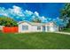 Charming single-story home featuring a vibrant green lawn at 5037 Water Wheel Ct, Ocoee, FL 34761