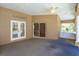 Large patio with doors leading to a pool and a wet bar overlooking the landscaped backyard at 513 N Pine Meadow Dr, Debary, FL 32713