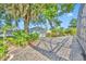 Manicured backyard featuring a storage shed at 5273 Sunset Canyon Dr, Kissimmee, FL 34758