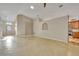 Open-concept living area with seamless transition to kitchen and dining, perfect for modern living and entertaining at 5273 Sunset Canyon Dr, Kissimmee, FL 34758