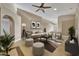 Comfortable living room featuring stylish furniture, neutral decor, and an inviting atmosphere for relaxation at 5273 Sunset Canyon Dr, Kissimmee, FL 34758