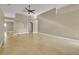 Large living room with a neutral palette offers versatile space and is ready for personalized design touches at 5273 Sunset Canyon Dr, Kissimmee, FL 34758