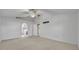 Spacious main bedroom featuring a ceiling fan, and an ensuite bathroom at 5273 Sunset Canyon Dr, Kissimmee, FL 34758