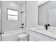 Bathroom featuring a shower/bathtub combo with white marble style subway tile surround at 586 Marion Oaks Trl, Ocala, FL 34473