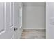 Bright bedroom featuring a window and wood-look flooring at 586 Marion Oaks Trl, Ocala, FL 34473