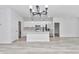 Bright living space with open floor plan and large kitchen island, great for entertaining at 586 Marion Oaks Trl, Ocala, FL 34473
